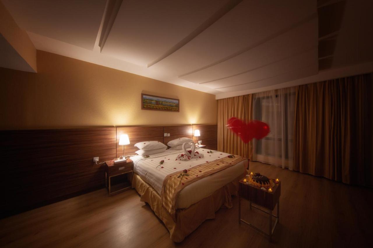 Al Safwah Orchid Hotel Mekka Zewnętrze zdjęcie A bedroom at the hotel